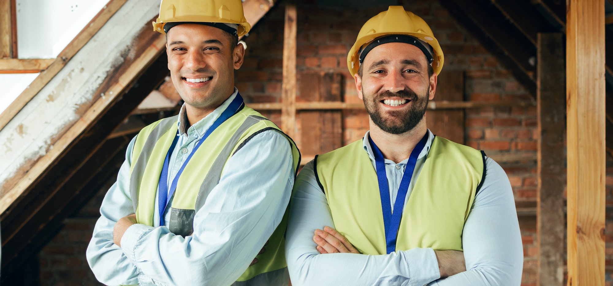Building, collaboration and portrait of construction workers with success, happiness and teamwork.
